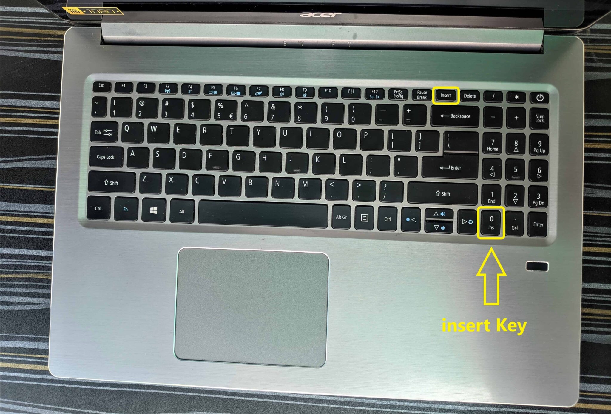 insert key on laptop-acer